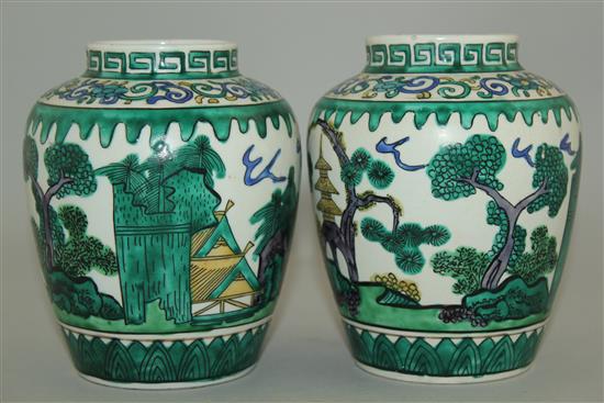 A pair of Japanese green Kutani ovoid jars, late 19th century, 13cm
